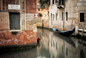 Italy, Venice. Gondola moored in canal. Credit as: Jim Nilsen / Jaynes Gallery / DanitaDelimont Italy, Venice. Gondola moored in canal. Credit as: Jim Nilsen / Jaynes Gallery / DanitaDelimont