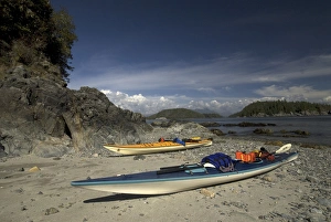 Kayaks at Dicebox Island, Broken Island Group, Pacific Rim National Park Preserve Kayaks at Dicebox Island, Broken Island Group, Pacific Rim National Park Preserve