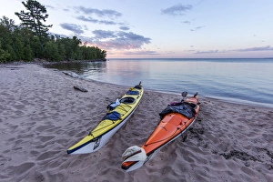 Kayaks on sand beach at York Island on the Apostle Islands National Lakeshore, Wisconsin Kayaks on sand beach at York Island on the Apostle Islands National Lakeshore, Wisconsin
