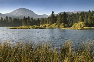 Lassen Peak at sunrise viewed across Manzanita Lake, Lassen Volcanic National Park Lassen Peak at sunrise viewed across Manzanita Lake, Lassen Volcanic National Park