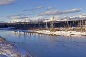 Late light on the North Fork of the Flathead River in winter in Glacier National Park Late light on the North Fork of the Flathead River in winter in Glacier National Park