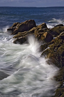 Long exposure of wave crashing against rocky coastline, Acadia National Park, Maine Long exposure of wave crashing against rocky coastline, Acadia National Park, Maine