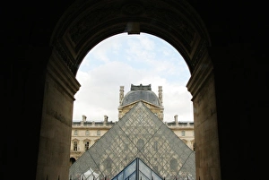 Louvre Museum. The large glass pyramid designed by the architect Leo Ming Pei, in 1981 Louvre Museum. The large glass pyramid designed by the architect Leo Ming Pei, in 1981