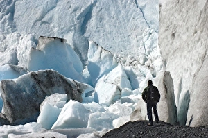 Man at base of Exit Glacier, Kenai Fjords National Park, AK (MR) Man at base of Exit Glacier, Kenai Fjords National Park, AK (MR)