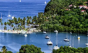 Marigot Bay, St. Lucia, Caribbean. marina, boats, palm trees, cove Marigot Bay, St. Lucia, Caribbean. marina, boats, palm trees, cove