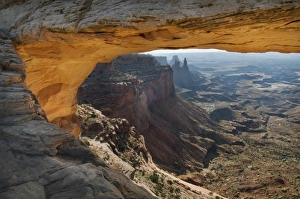 Mesa Arch reflected golden sunrise light, Island in the sky district, Canyonlands National Park Mesa Arch reflected golden sunrise light, Island in the sky district, Canyonlands National Park