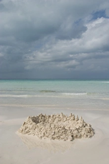 Mexico, Yucatan, Isla Mujeres (Island of Women), sand castle on beach and Caribbean Sea Mexico, Yucatan, Isla Mujeres (Island of Women), sand castle on beach and Caribbean Sea
