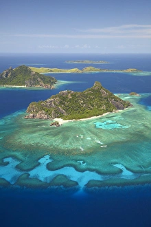 Monuriki Island and coral reef, Mamanuca Islands, Fiji, South Pacific - aerial Monuriki Island and coral reef, Mamanuca Islands, Fiji, South Pacific - aerial