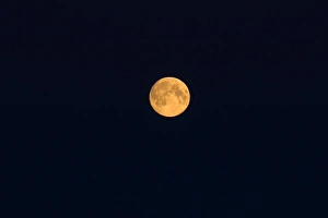 full moon over the Inupiat village of Kaktovik, Barter Island, 1002 area of the Arctic full moon over the Inupiat village of Kaktovik, Barter Island, 1002 area of the Arctic
