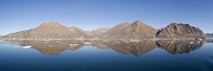 Mountain reflection panorama Godthab Golf North East Greenland National Park Greenland Mountain reflection panorama Godthab Golf North East Greenland National Park Greenland