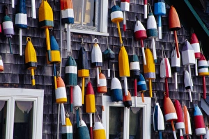 NA, USA, Maine. Bouys on side of building in the town of Bernard NA, USA, Maine. Bouys on side of building in the town of Bernard