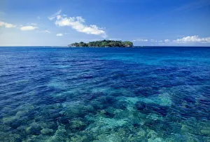 Negril, Jamaica. The island of Booby Cay at the end of Long Bay Beach. Tropical island Negril, Jamaica. The island of Booby Cay at the end of Long Bay Beach. Tropical island