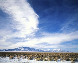NEVADA. USA. Cirrus clouds above Spring Valley & Schell Creek Range in early winter NEVADA. USA. Cirrus clouds above Spring Valley & Schell Creek Range in early winter