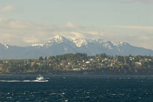 North America, USA, WA, Admiralty Inlet, Strait of Juan de Fuca. Boat navigates Admiralty North America, USA, WA, Admiralty Inlet, Strait of Juan de Fuca. Boat navigates Admiralty