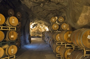 Oak aging barrels in cavern at Ironstone Winery, near Murphys, Calaveras county, California, USA Oak aging barrels in cavern at Ironstone Winery, near Murphys, Calaveras county, California, USA