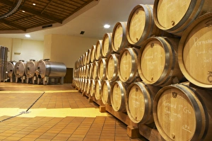 Oak barrels in rows and stainless steel roto-fermenters rotofermenters, Maison Louis Jadot Oak barrels in rows and stainless steel roto-fermenters rotofermenters, Maison Louis Jadot