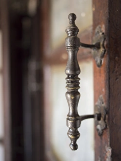 Old fashioned metal doorhandle in Shilpgram artisans village near Udaipur, Rajasthan Old fashioned metal doorhandle in Shilpgram artisans village near Udaipur, Rajasthan