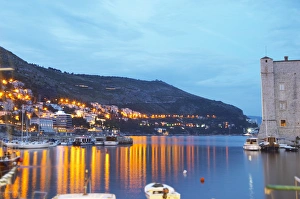 The old harbour with evening city light reflections in the water, Saint John's The old harbour with evening city light reflections in the water, Saint John's