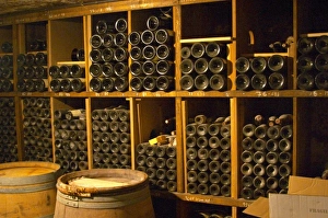 Older vintages of wine aging in the cellar. Alain Voge, Cornas, Ardeche, Ardeche Older vintages of wine aging in the cellar. Alain Voge, Cornas, Ardeche, Ardeche