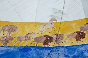Angel Wynn Collection: Painted buffalo herd and horses decorate a Lakota Sioux tepee