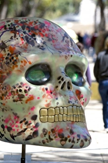 A painted skull is part of a public art display to celebrate the Day of the Dead in Mexico City A painted skull is part of a public art display to celebrate the Day of the Dead in Mexico City