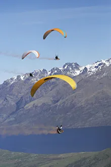 Paragliders over Lake Wakatipu, Queenstown, South Island, New Zealand Paragliders over Lake Wakatipu, Queenstown, South Island, New Zealand