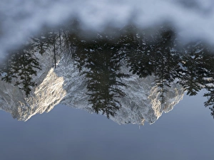 Peak of Zugspitze (2962m), germanys highest mountain, during winter is reflected in lake Eibsee Peak of Zugspitze (2962m), germanys highest mountain, during winter is reflected in lake Eibsee