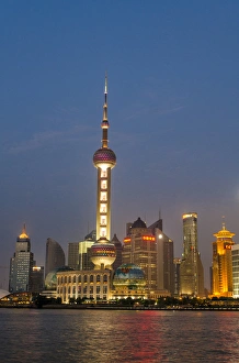 Pearl Tower over Pudong district skyline and Huangpu River Shanghai, China Pearl Tower over Pudong district skyline and Huangpu River Shanghai, China
