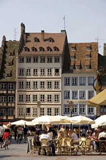 People gather in Cathedral Plaza and outdoor cafe at Strasbourg, France People gather in Cathedral Plaza and outdoor cafe at Strasbourg, France