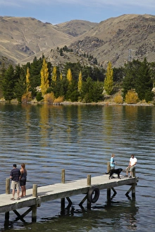 People on jetty, Lake Dunstan, Cromwell, Central Otago, South Island, New Zealand People on jetty, Lake Dunstan, Cromwell, Central Otago, South Island, New Zealand