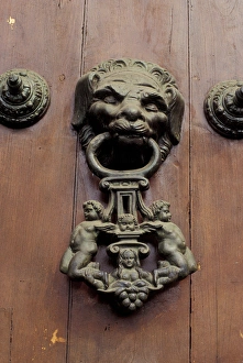 Peru, Lima. Bronze ornaments on the wood doors of Cathedral. Plaza de Armas Peru, Lima. Bronze ornaments on the wood doors of Cathedral. Plaza de Armas