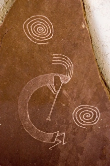 Pictograph of the legendary figure called Kokopeli who brought the wooden flute Pictograph of the legendary figure called Kokopeli who brought the wooden flute