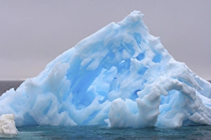 pinnacle iceberg floating off the western Antarctic peninsula, Antarctica, Southern Ocean pinnacle iceberg floating off the western Antarctic peninsula, Antarctica, Southern Ocean