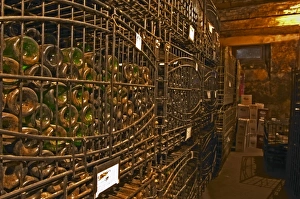 The private bottle aging cellar with hundreds, thousands of bottles in metal wrought The private bottle aging cellar with hundreds, thousands of bottles in metal wrought