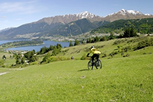 Queenstown, Deer Park, New Zealand. Bike riding through the outer lying hills of Queenstown Queenstown, Deer Park, New Zealand. Bike riding through the outer lying hills of Queenstown