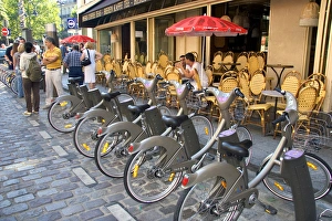 A rack of rental bicycles are part of the Velib, a bike transit system in Paris, France A rack of rental bicycles are part of the Velib, a bike transit system in Paris, France