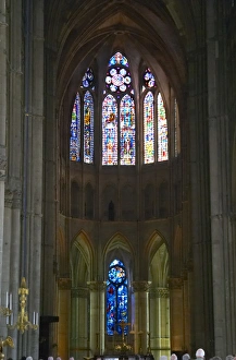 The Reims Cathedral: the stained glass windows behind the altar The Reims Cathedral: the stained glass windows behind the altar