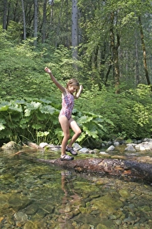 Released girl walking in Hazel Creek California Released girl walking in Hazel Creek California