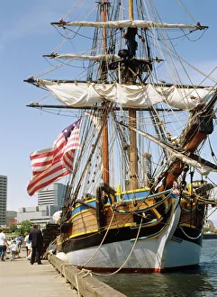 A replica of a Revolutionary War era sailing ship docked at the Portland sea wall A replica of a Revolutionary War era sailing ship docked at the Portland sea wall