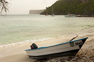 Rescue boat on beach at Sardinera, Mona Island, Puerto Rico Rescue boat on beach at Sardinera, Mona Island, Puerto Rico