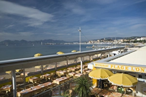 Restaurants on the beach walk area of Cannes, France Restaurants on the beach walk area of Cannes, France