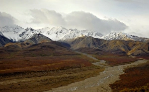 The rich colors of Polychrome Pass are set off by jagged peaks and braided streams The rich colors of Polychrome Pass are set off by jagged peaks and braided streams