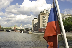 Russia. Moscow. Russian flag and the Moscow River from a tour boat Russia. Moscow. Russian flag and the Moscow River from a tour boat