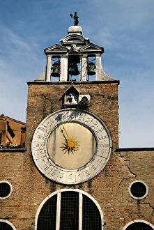 The San Giacomo Church on the Islet of Rialto is adorned large 15th century clock The San Giacomo Church on the Islet of Rialto is adorned large 15th century clock