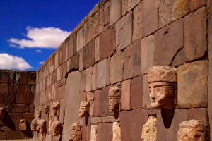 Sculpture head sticking out from ancient wall at Tiwanak Ruins, La Paz, Bolivia Sculpture head sticking out from ancient wall at Tiwanak Ruins, La Paz, Bolivia