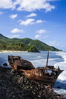 Shipwreck on the east coast of Tutuila island, American Samoa, South Pacific Shipwreck on the east coast of Tutuila island, American Samoa, South Pacific
