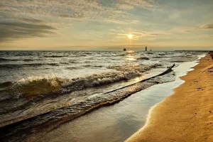 Shoreline of Lake Michigan and distant Grand Haven Lighthouse and pier, Grand Haven Shoreline of Lake Michigan and distant Grand Haven Lighthouse and pier, Grand Haven