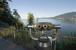 Sightseeing binoculars overlooking Burrard Inlet and Lions Gate Bridge from Prospect Point Sightseeing binoculars overlooking Burrard Inlet and Lions Gate Bridge from Prospect Point