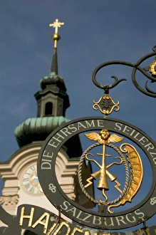 Sign for rope shop, church tower, Salzburg, Austria Sign for rope shop, church tower, Salzburg, Austria