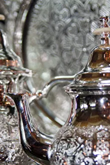 Silver teapot in metalworking shop, Fes, Morocco Silver teapot in metalworking shop, Fes, Morocco